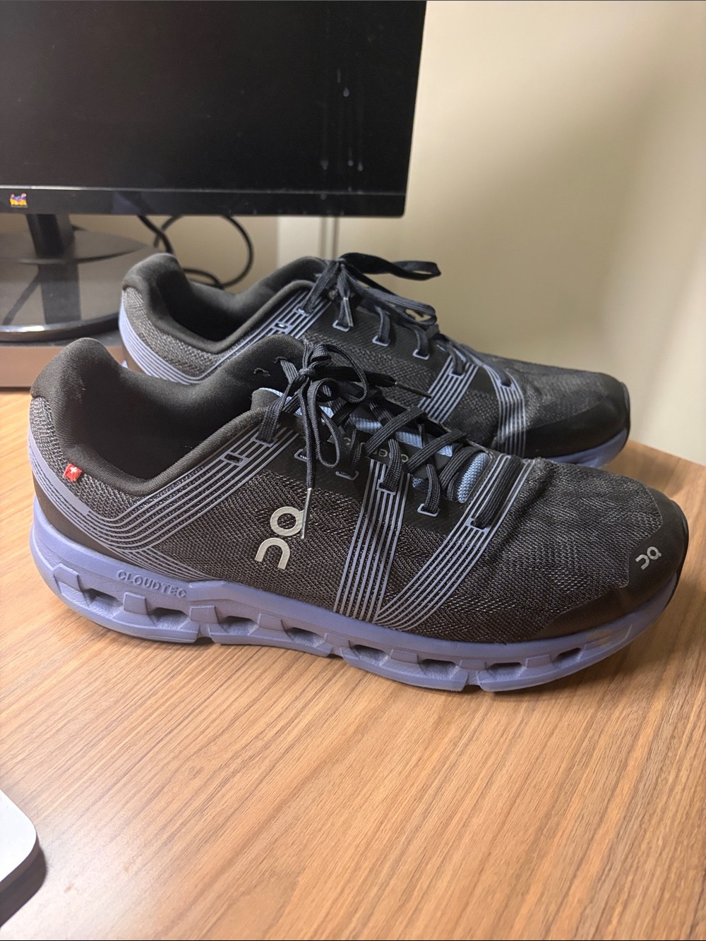 On Running Men’s Athletic Shoes in Black with Lavender Sole